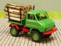 Preview: 1/87 Brekina Unimog 411 mit Holzladung resegrün/rubinrot 39028