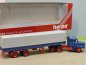 Preview: 1/87 Herpa Scania Hauber blau/rot Planen-Sattelzug 836008