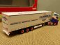 Preview: 1/87 Herpa Volvo FH Gl. LNG F.A.Kruse Gardinenplanen-Sattelzug 313407