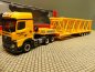 Preview: 1/87 Herpa MB Arocs L 6x4 Semitieflade-Sattelzug mit Gittermastteilen Franz Bracht 311076