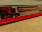 Preview: 1/87 Herpa Volvo FH FD Langholztransporter-Sattelzug schwarz/rot 313575