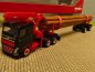 Preview: 1/87 Herpa Volvo FH FD Langholztransporter-Sattelzug schwarz/rot 313575