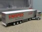 Preview: 1/87 Herpa MAN TGX XXL UNISPED Delfi Warehousing Gardinenplanen-Sattelzug