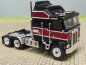 Preview: 1/87 Brekina Kenworth K 100 Aerodyne schwarz/dunkelrot 85726