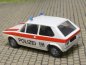 Preview: 1/87 Brekina VW Golf I Polizei Zürich, Wappen, weiss, roter Seitenstreifen