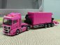 Preview: 1/87 Herpa MAN TGX XLX Hammar Seitenlader mit 20ft. Container magenta