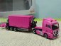 Preview: 1/87 Herpa MAN TGX XLX Hammar Seitenlader mit 20ft. Container magenta