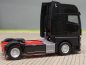 Preview: 1/87 Herpa MAN TGX GX Zugmaschine schwarz 311922-003