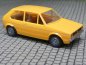 Preview: 1/87 Brekina VW Golf I gelb, Zierlinie schwarz, Stoßstange silber (G1#27)