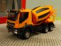 Preview: 1/87 Herpa Iveco Trakker 6x6 Betonmischer-LKW orange 310000