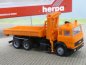 Preview: 1/87 Herpa IVECO Turbo komunal orange Absetzpritsche + Ladekran 141758