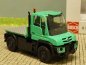 Preview: 1/87 Busch MB Unimog U430 mit flacher Pritsche grün 50930