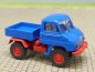 Preview: 1/87 Brekina Unimog 411 blau/rot Sondermodell Reinhardt