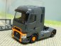 Preview: 1/87 Herpa Renault T 2-Achs Zugmaschine dunkelgrau orange