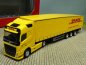 Preview: 1/87 Herpa Volvo FH Gl. 2020 DHL Schmitz Ecoflex-Sattelzug 314626