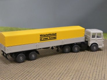 1/87 Wiking MAN F80 Wirtschaftlichkeit ist unser Konzept Planensattelzug