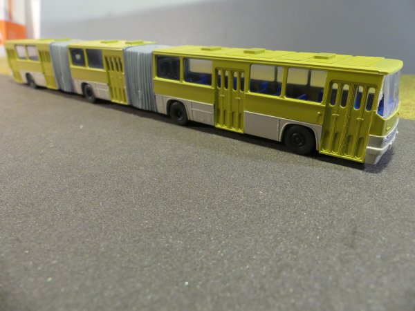1/87 SES Ikarus 293 Doppel-Gelenkbus grün/grau 14130704