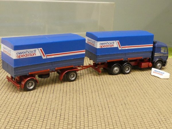 1/87 Herpa MB SK ewerhardt spedition Wechselplanen-Hängerzug in Faltbox