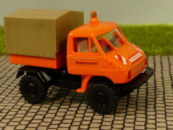 1/87 Brekina Unimog 411 Straßenmeisterei Pritsche/Plane 90107