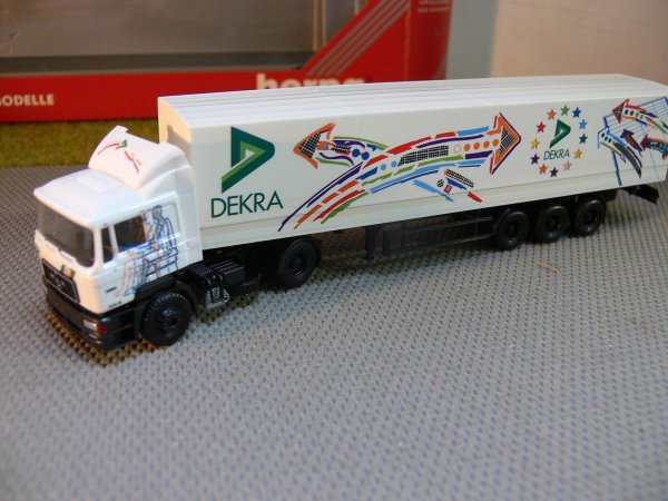 1/87 Herpa MAN F2000 Dekra Planensattelzug 184458