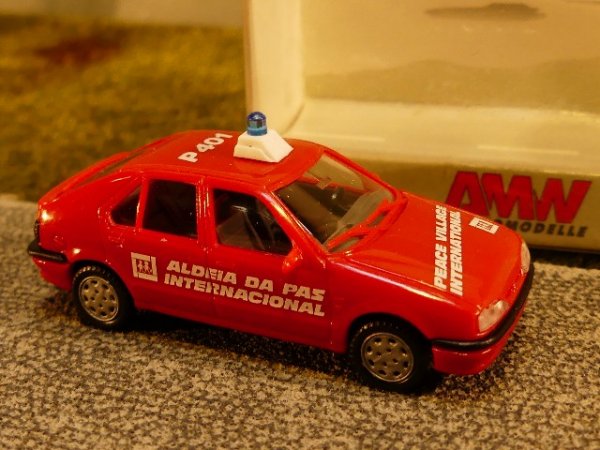 1/87 AWM Renault 19 Friedensdorf International mit Blaulicht