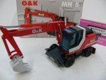 1/50 NZG O&K MH 5 Bagger rot 457